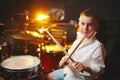 Boy plays drums in recording studio Royalty Free Stock Photo