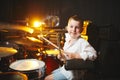 Boy plays drums in recording studio Royalty Free Stock Photo