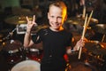 Boy plays drums in recording studio Royalty Free Stock Photo