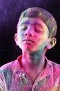 A boy plays Holi Royalty Free Stock Photo