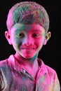 A boy plays Holi Royalty Free Stock Photo