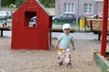 Boy plays in playground