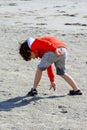 Boy plays at the seaside Royalty Free Stock Photo
