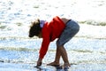 Boy plays at the seaside Royalty Free Stock Photo