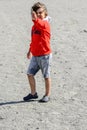 Boy plays at the seaside Royalty Free Stock Photo