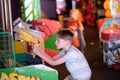 The boy plays shooting games Royalty Free Stock Photo