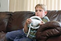 Boy plays video game Royalty Free Stock Photo