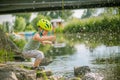 Boy plays with water near a lake Royalty Free Stock Photo