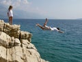 Boy plunges into the sea Royalty Free Stock Photo