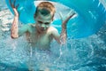 Boy in pool splashing Royalty Free Stock Photo