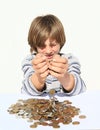 Boy pooring money Royalty Free Stock Photo