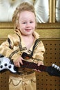 Boy in pop retro suit playing the guitar Royalty Free Stock Photo