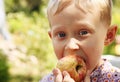 Boy portrait with apple Royalty Free Stock Photo