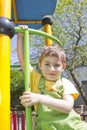 Boy. Portrait of cute boy kid outdoor in sunny day. Portrait of Happy blond child smiling. Boy looking at the camera with a handso Royalty Free Stock Photo