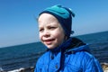 Boy posing on black sea background Royalty Free Stock Photo