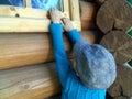 Little boy posing wooden wall Royalty Free Stock Photo
