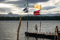 Boy posing on the end of the wooden pier