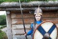 Boy posing in Viking Armor with shield