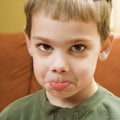 Boy pouting. Royalty Free Stock Photo