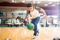 Boy Practicing His Swing At A Bowling Alley Royalty Free Stock Photo