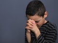 Boy Praying to god stock photo