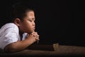 Boy Praying To God At Home