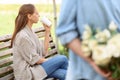 Boy presenting flowers to girl Royalty Free Stock Photo