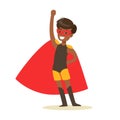 Boy Pretending To Have Super Powers Dressed In Black Superhero Costume With Red Cape And Mask Smiling Character Royalty Free Stock Photo