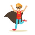 Boy Pretending To Have Super Powers Dressed In Red Superhero Costume With Black Cape And Mask Smiling Character Royalty Free Stock Photo