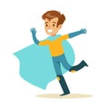 Boy Pretending To Have Super Powers Dressed In Superhero Costume With Blue Cape Running Smiling Character Royalty Free Stock Photo