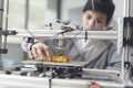 Boy printing a prototype using a 3D printer Royalty Free Stock Photo
