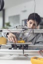 Boy printing a prototype using a 3D printer Royalty Free Stock Photo