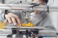 Boy printing a prototype using a 3D printer Royalty Free Stock Photo