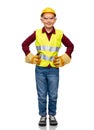 boy in protective helmet, gloves and safety vest Royalty Free Stock Photo