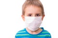 A boy with a protective mask against viruses or coronovirus or infection stands