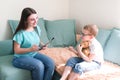 Boy in a psychologist`s office. Psychologist talking to a child Royalty Free Stock Photo