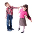 Boy pulling girl's hair