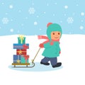 The boy pulls a sled with gifts