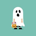 Boy with pumpkin basket dressed in ghost costume Royalty Free Stock Photo