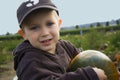 Boy on the Pumpkin Farm Royalty Free Stock Photo