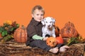 Boy and puppy in Halloween decoration