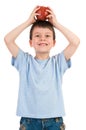 Boy put apple on his head Royalty Free Stock Photo