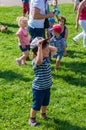 Boy putting hat on Royalty Free Stock Photo