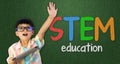 Boy raise his hand up for STEM education