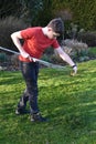 Boy raking up grass Royalty Free Stock Photo