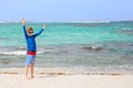 Boy in rashguard and swimwear at the beach Royalty Free Stock Photo