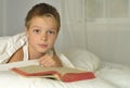 Boy is reading Bible