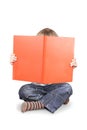 Boy reading a big book Royalty Free Stock Photo