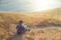 Boy reading book outside at sunset Royalty Free Stock Photo