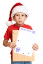 Boy in red hat with letter to santa - winter holiday christmas concept Royalty Free Stock Photo